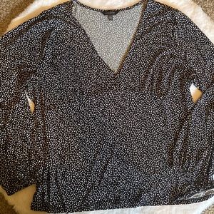 Plus size black and white dot deep v-neck blouse